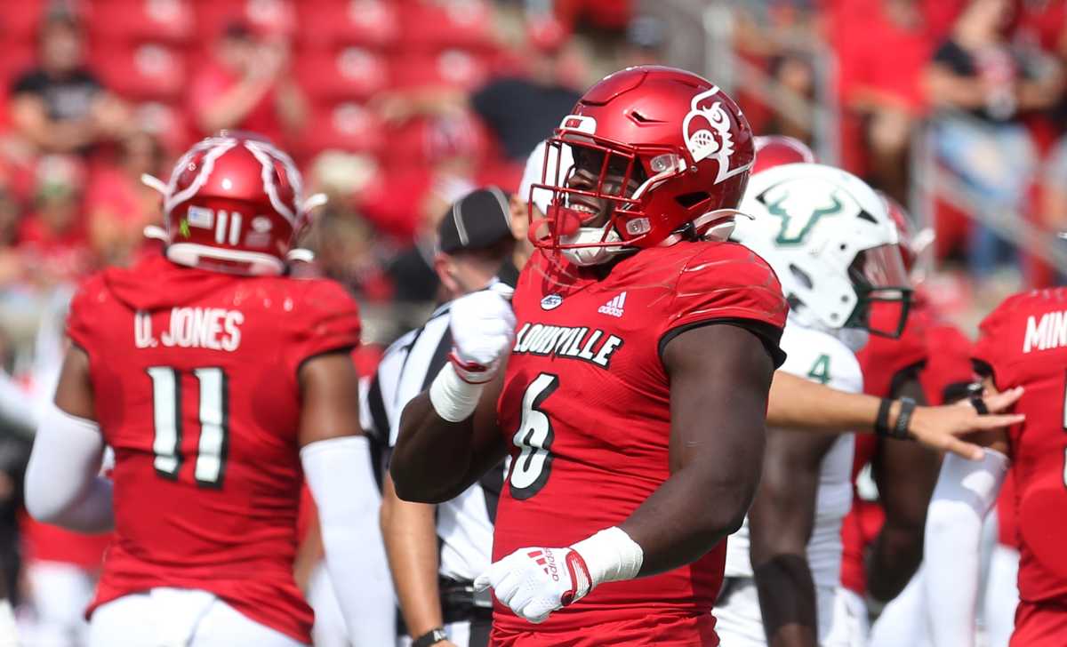 Louisville s YaYa Diaby celebrates his sack against USF.